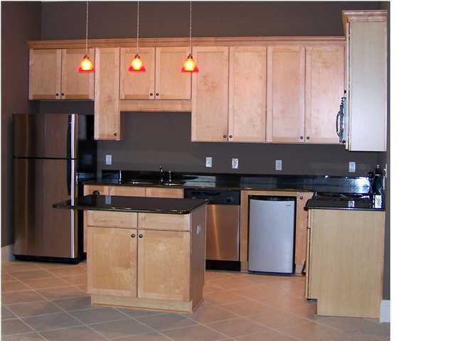 122 Shorebird Drive Santa Rosa Beach, FL 32459 - Photo 3 of 6 a kitchen with a sink and cabinets
