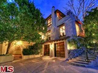 a view of a building with a tree