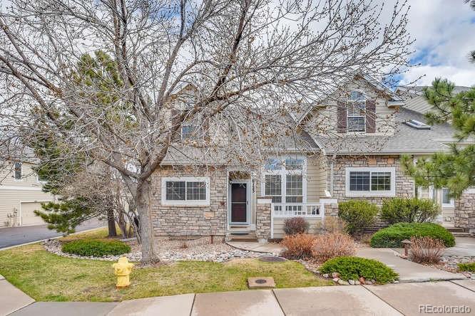 6123 Trailhead Road Highlands Ranch, CO 80130 - Photo 2 of 26 front view of house with a yard