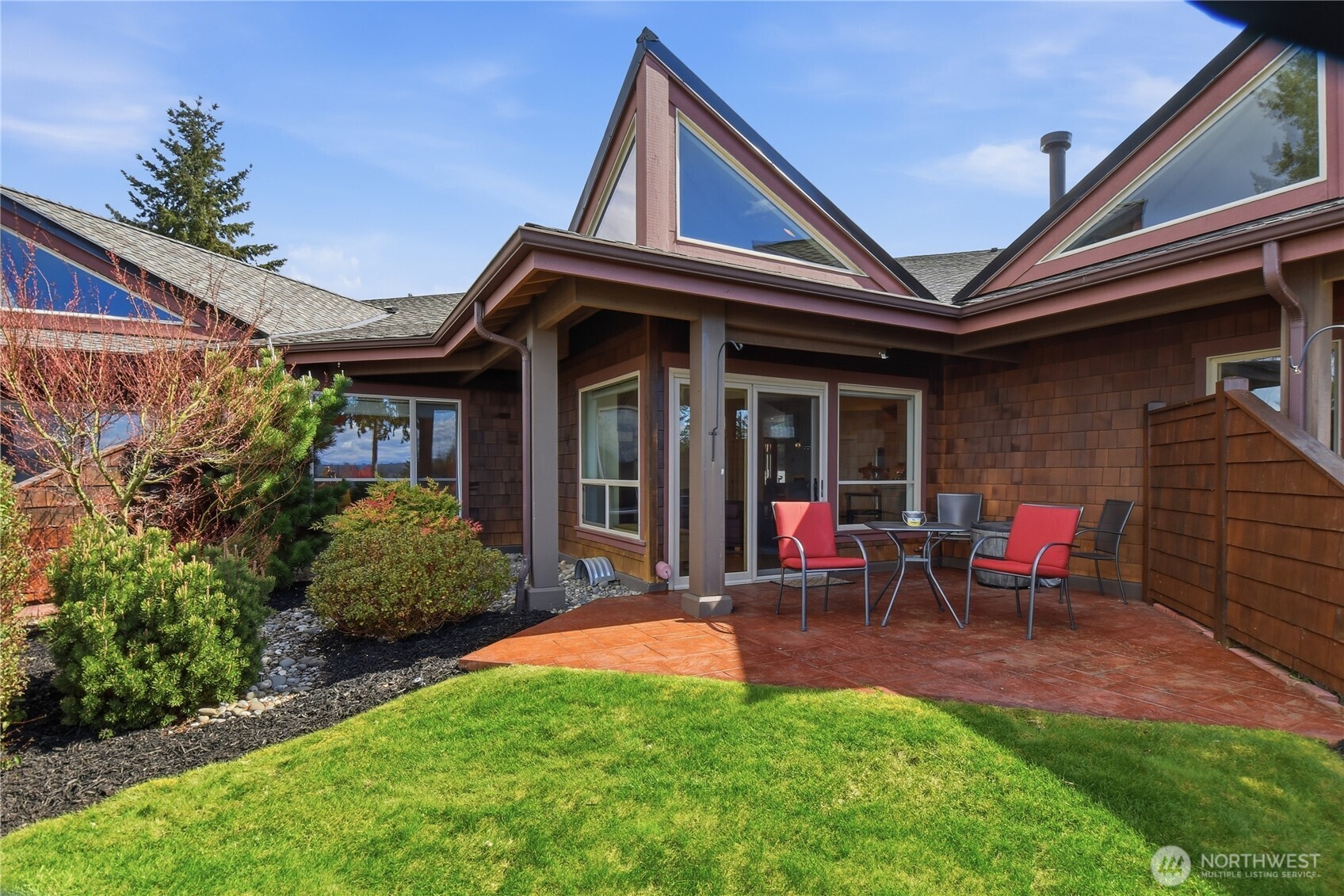 383 Romance Hill Road, Unit C Belfair, WA 98528 - Photo 18 of 25 a view of outdoor space yard deck and patio