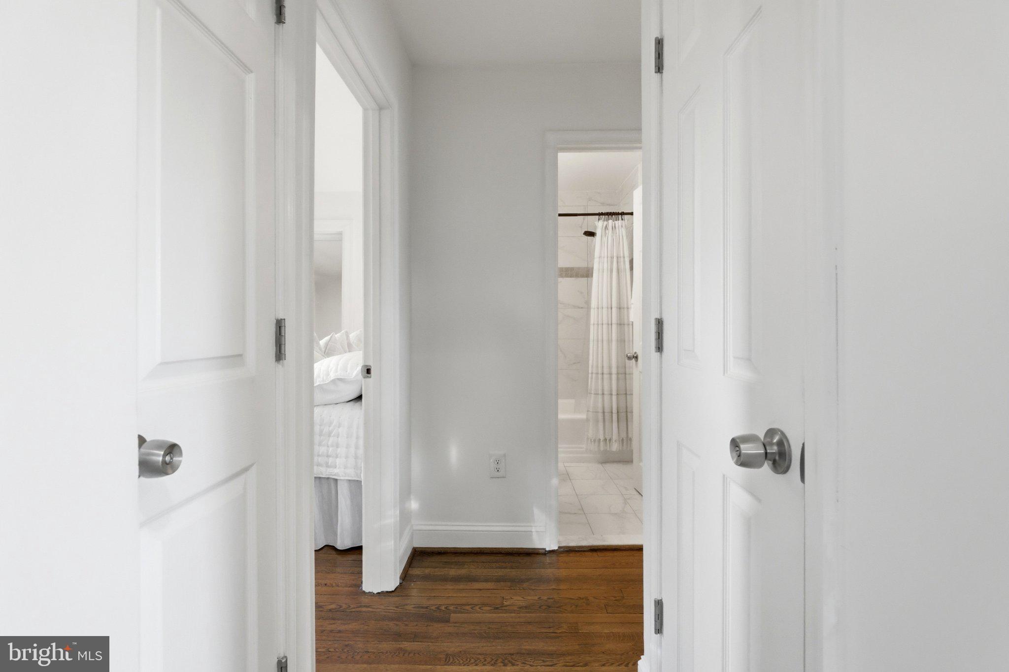 10419 Grandin Road Silver Spring, MD 20902 - Photo 17 of 44 Inviting hallway with bright doors.