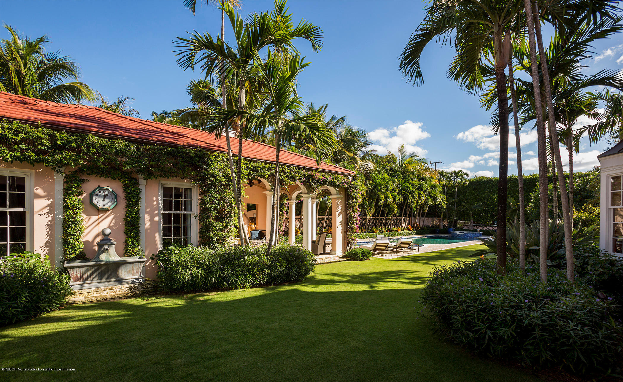 5 Middle Road Palm Beach, FL 33480 - Photo 3 of 7 a view of a house with a swimming pool