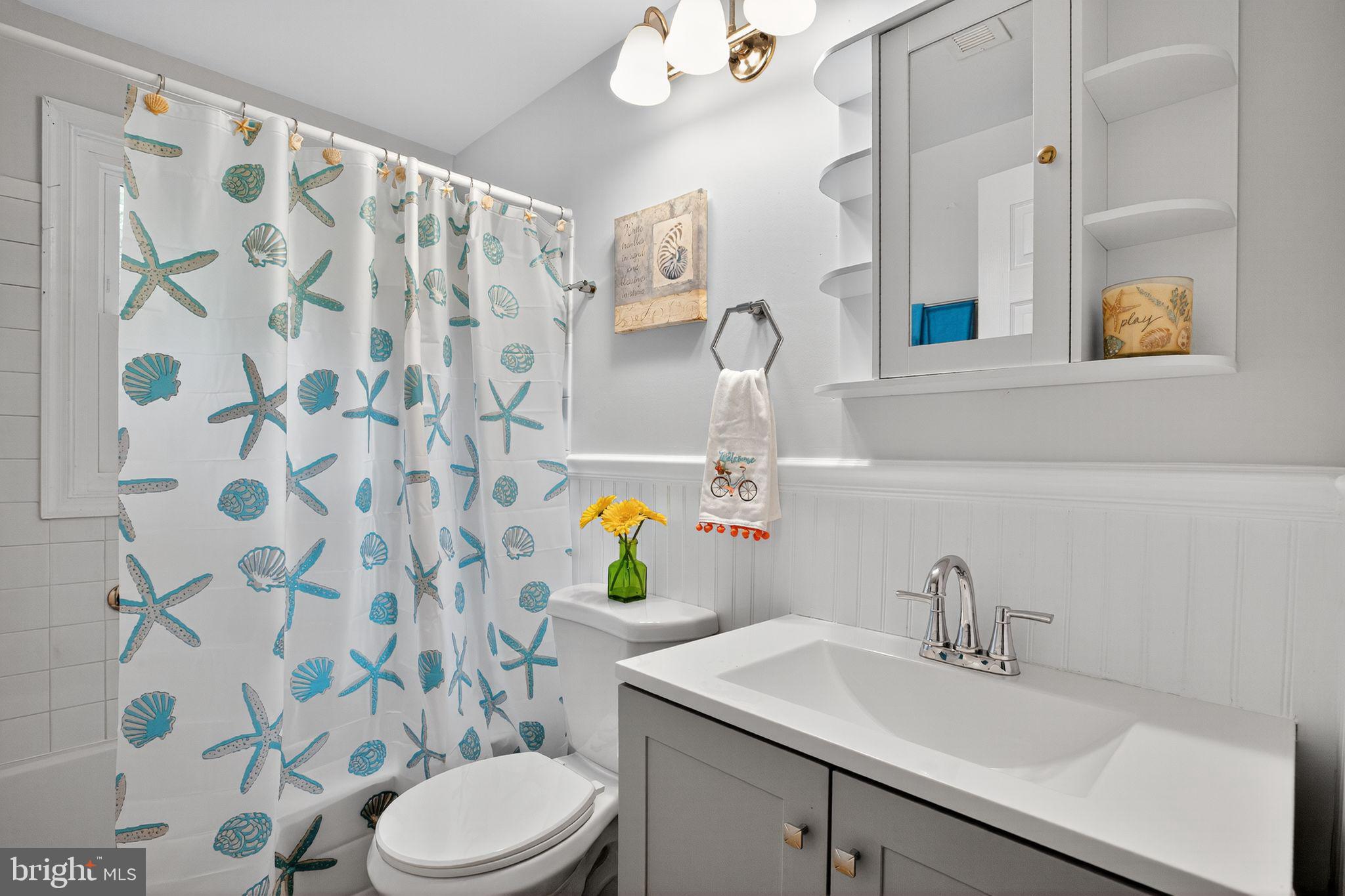 2895 Pomona Road Colonial Beach, VA 22443 - Photo 19 of 29 a bathroom with a sink toilet and shower