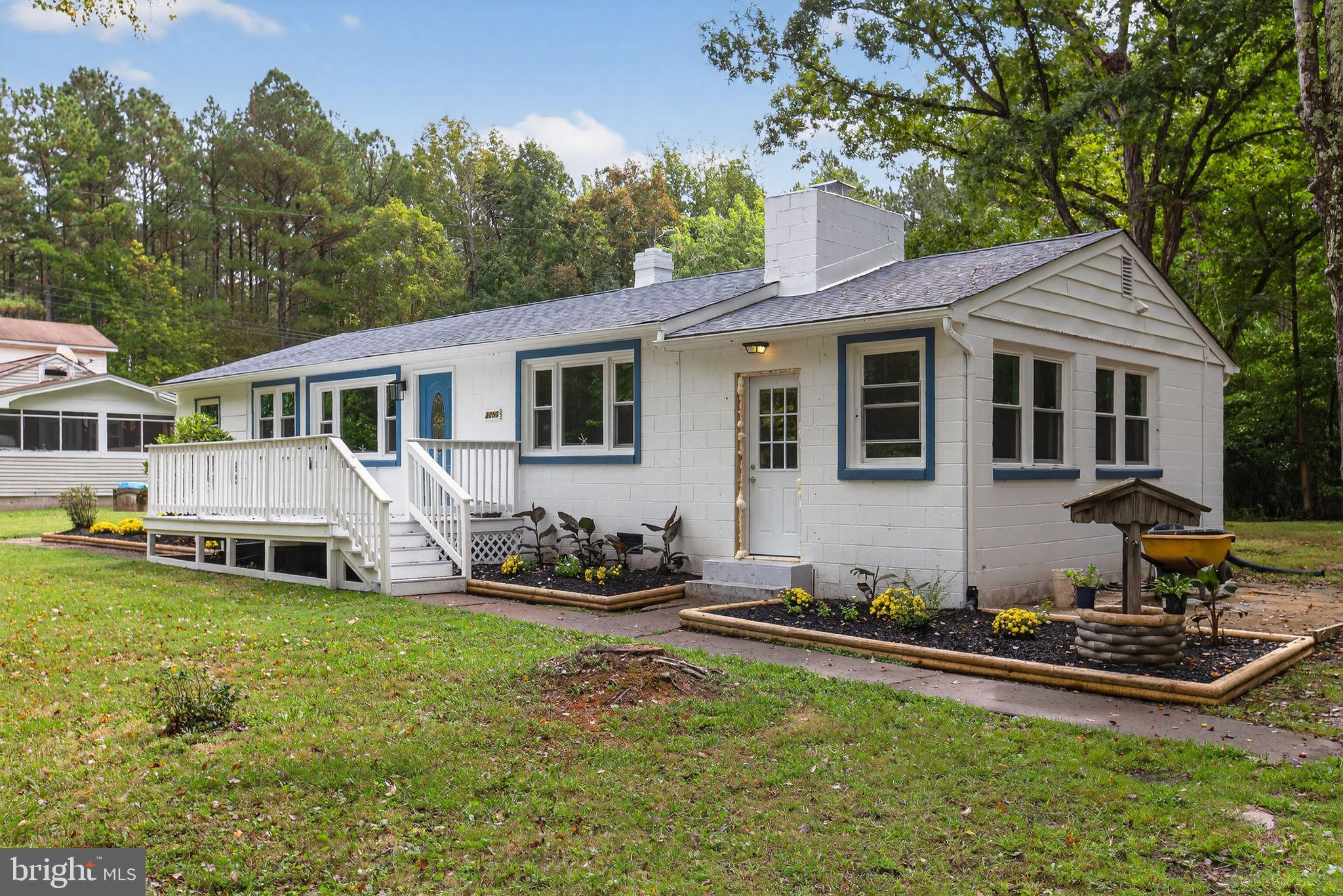 2895 Pomona Road Colonial Beach, VA 22443 - Photo 22 of 29 a front view of a house with garden
