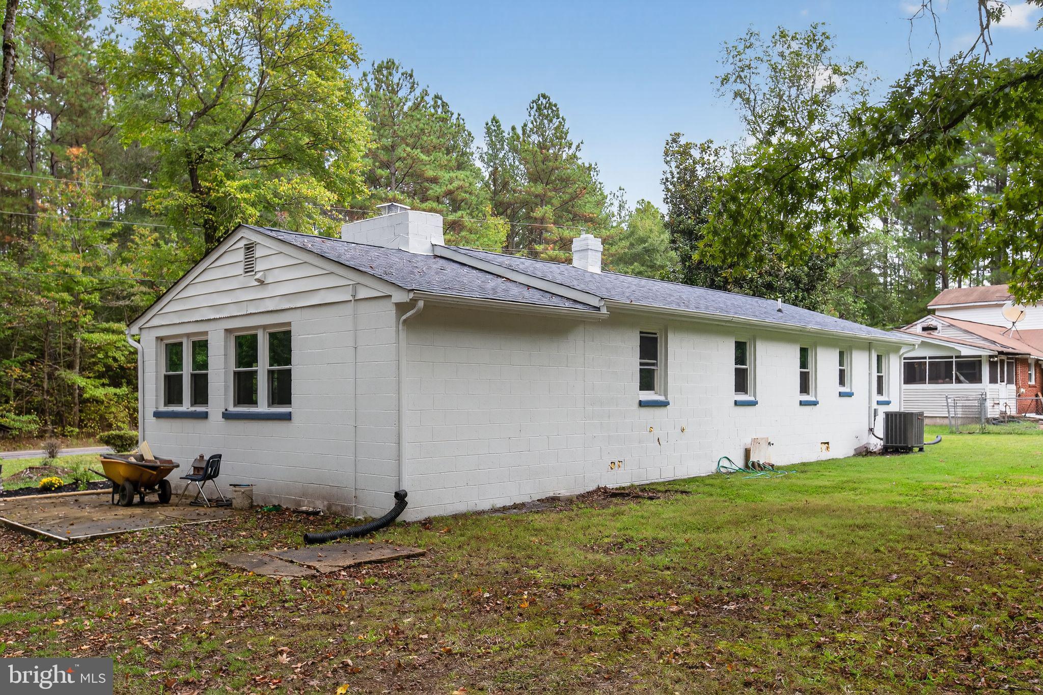 2895 Pomona Road Colonial Beach, VA 22443 - Photo 24 of 29 a front view of a house with garden