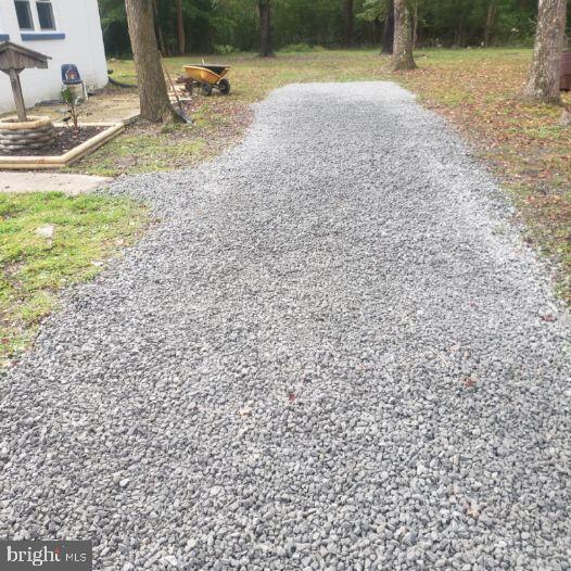 2895 Pomona Road Colonial Beach, VA 22443 - Photo 28 of 29 a view of yard with swimming pool and trees