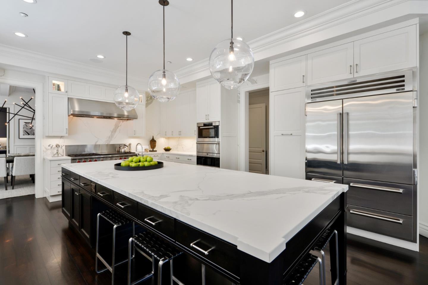 5 Faxon Forest Atherton, CA 94027 - Photo 11 of 46 a kitchen with a refrigerator a sink and wooden floor