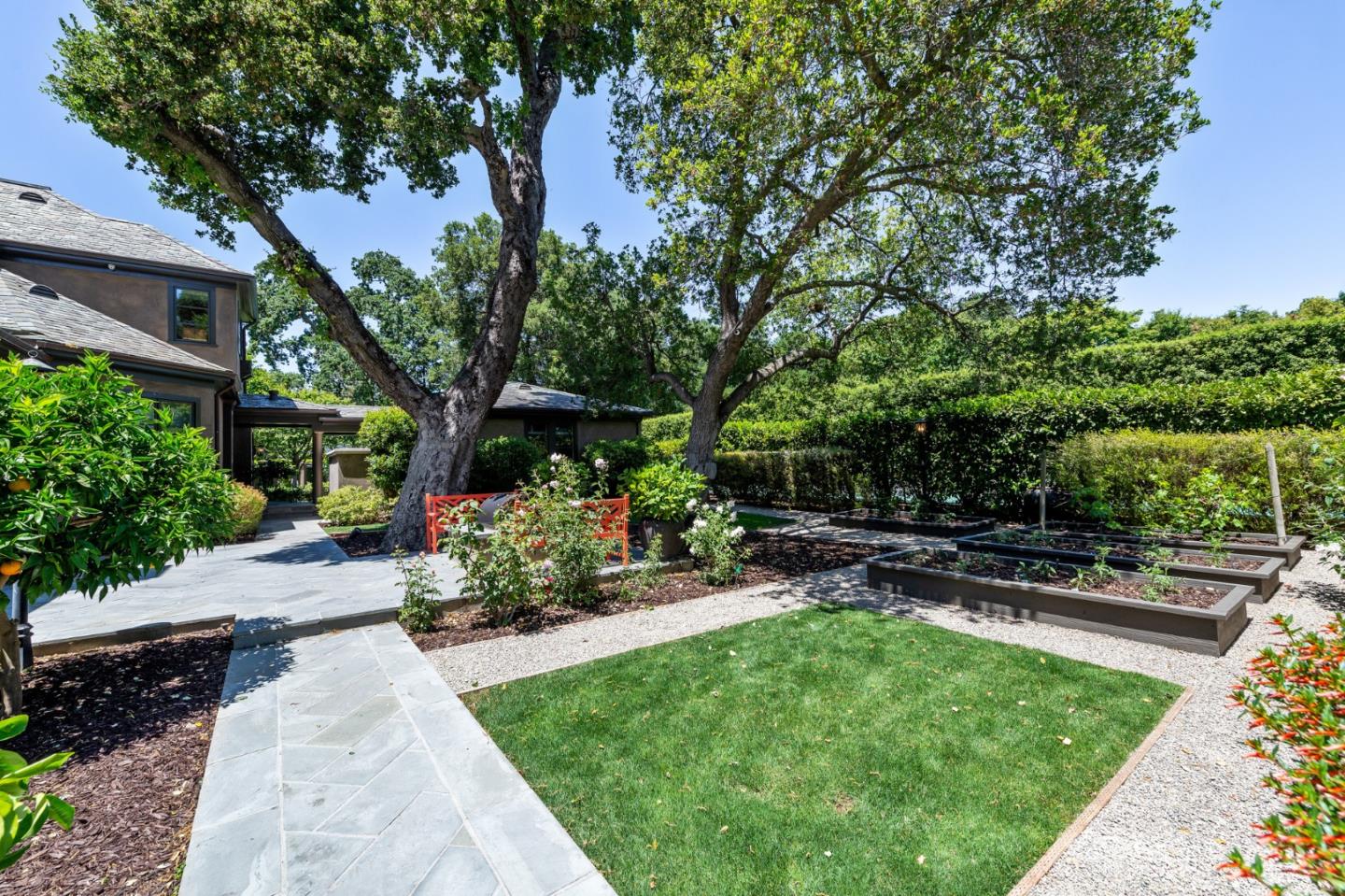 5 Faxon Forest Atherton, CA 94027 - Photo 17 of 46 a view of a backyard with sitting area
