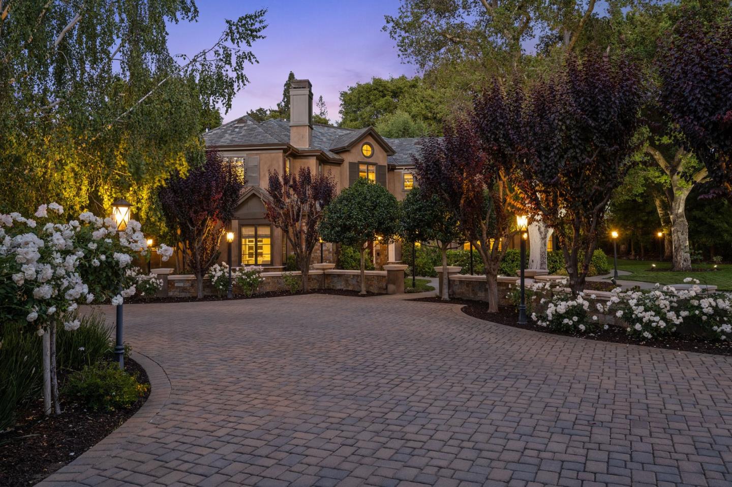 5 Faxon Forest Atherton, CA 94027 - Photo 2 of 46 a front view of a house with a yard and tree s