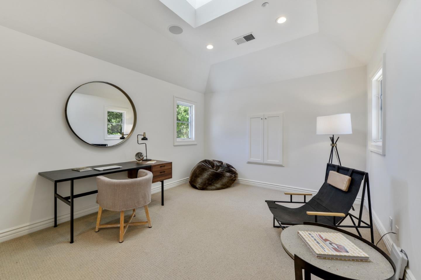 5 Faxon Forest Atherton, CA 94027 - Photo 27 of 46 a living room with furniture and a mirror