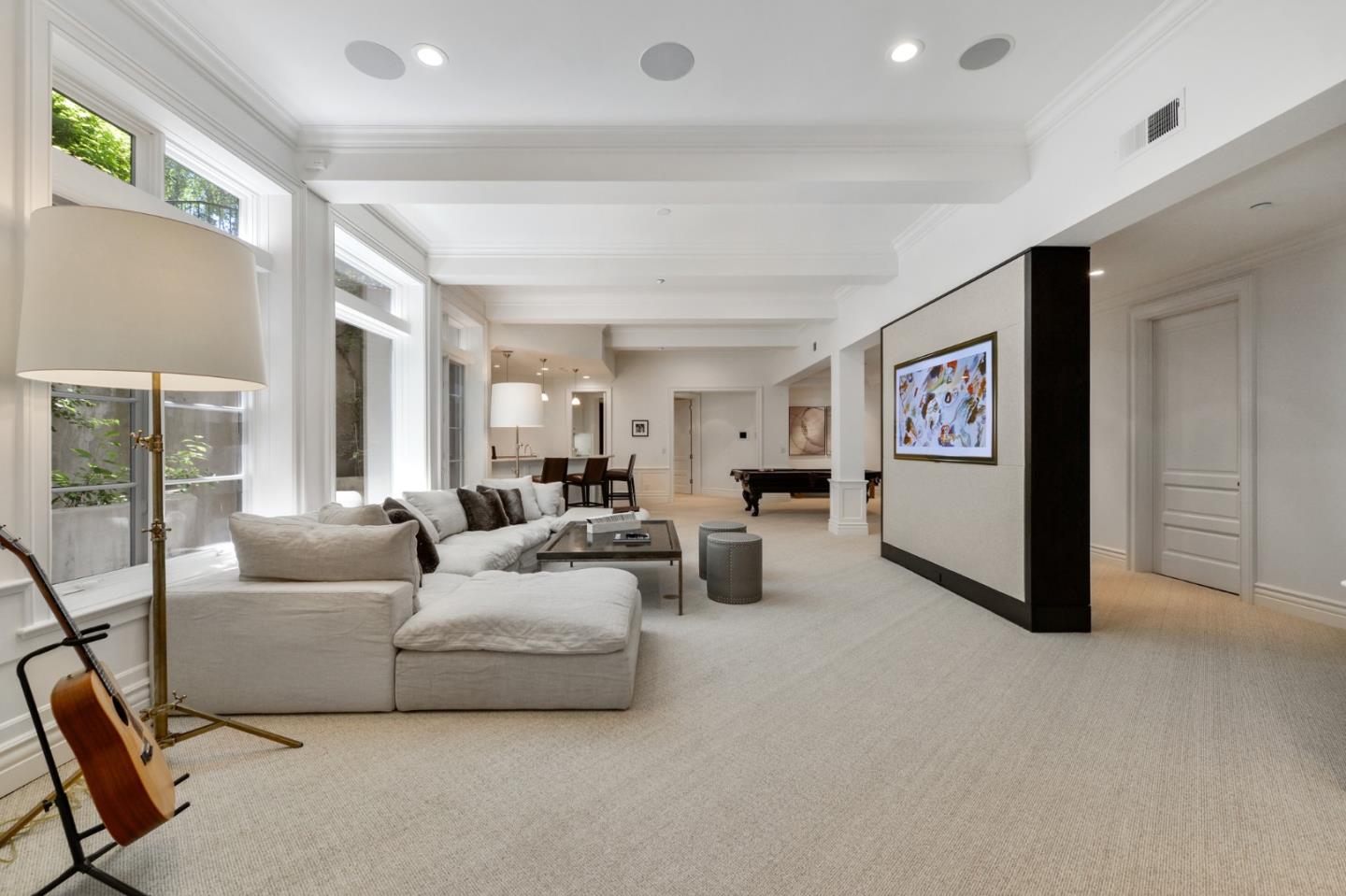 5 Faxon Forest Atherton, CA 94027 - Photo 29 of 46 a living room with furniture and a flat screen tv