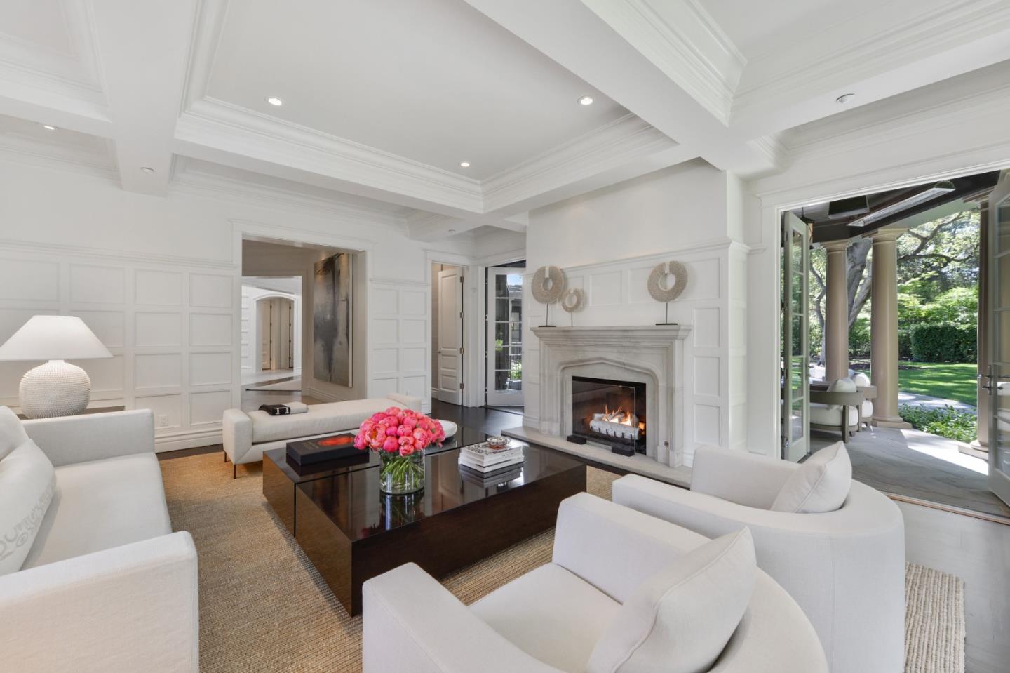 5 Faxon Forest Atherton, CA 94027 - Photo 6 of 46 a living room with furniture a fireplace and a floor to ceiling window