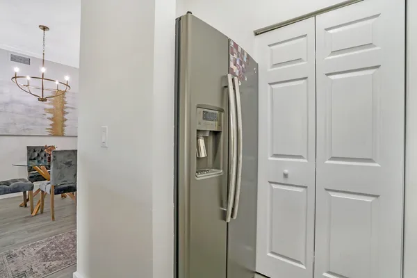a bathroom with a shower and a mirror