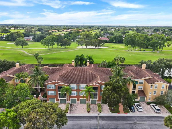 an aerial view of a house with outdoor space ocean view