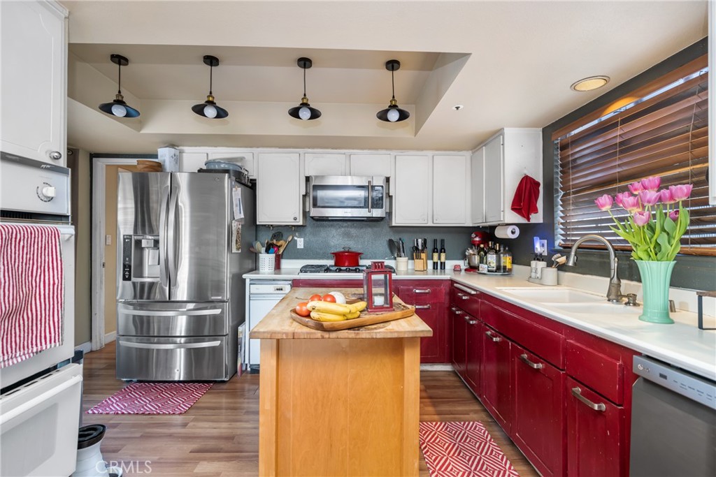 235 Via Ballena San Clemente, CA 92672 - Photo 22 of 51 a kitchen with stainless steel appliances granite countertop a refrigerator and a stove