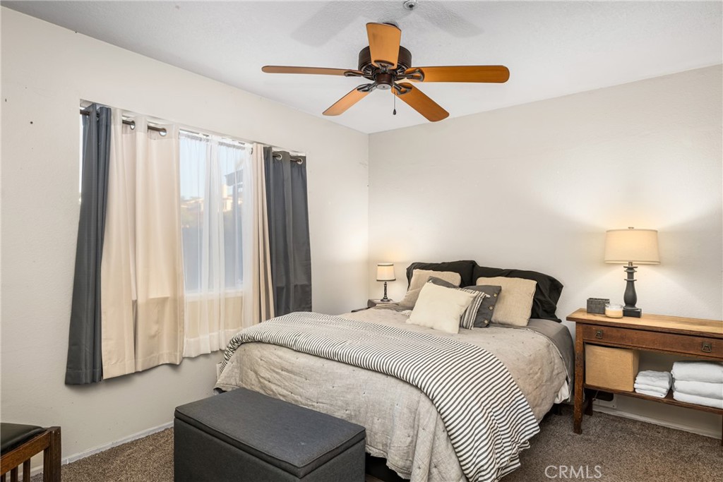 235 Via Ballena San Clemente, CA 92672 - Photo 27 of 51 a bedroom with a bed and a window