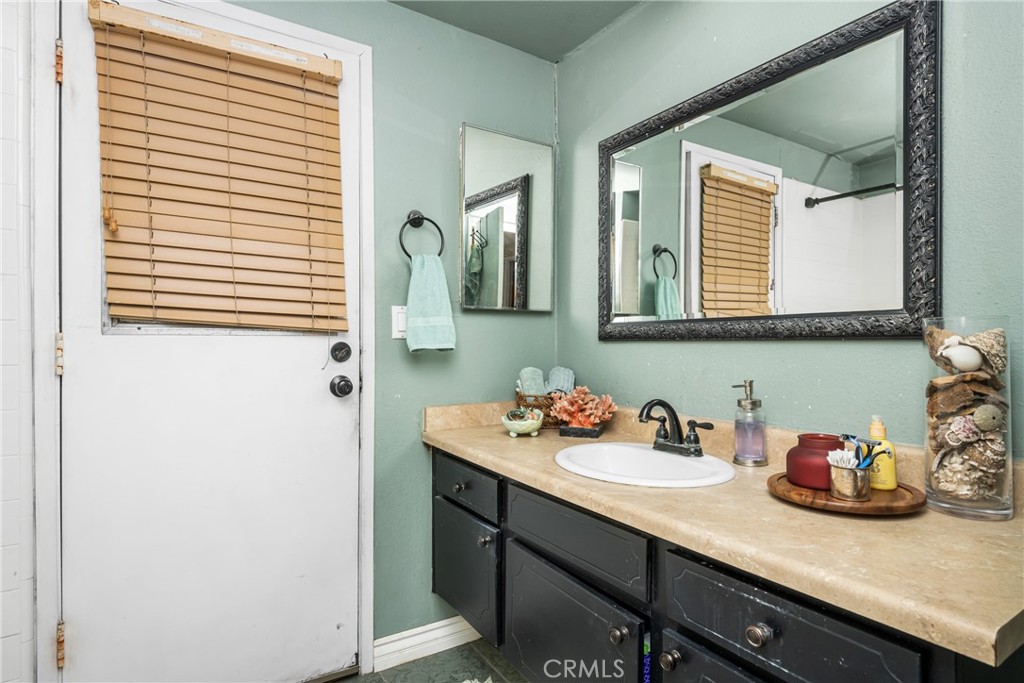 235 Via Ballena San Clemente, CA 92672 - Photo 28 of 51 a bathroom with a sink and a mirror