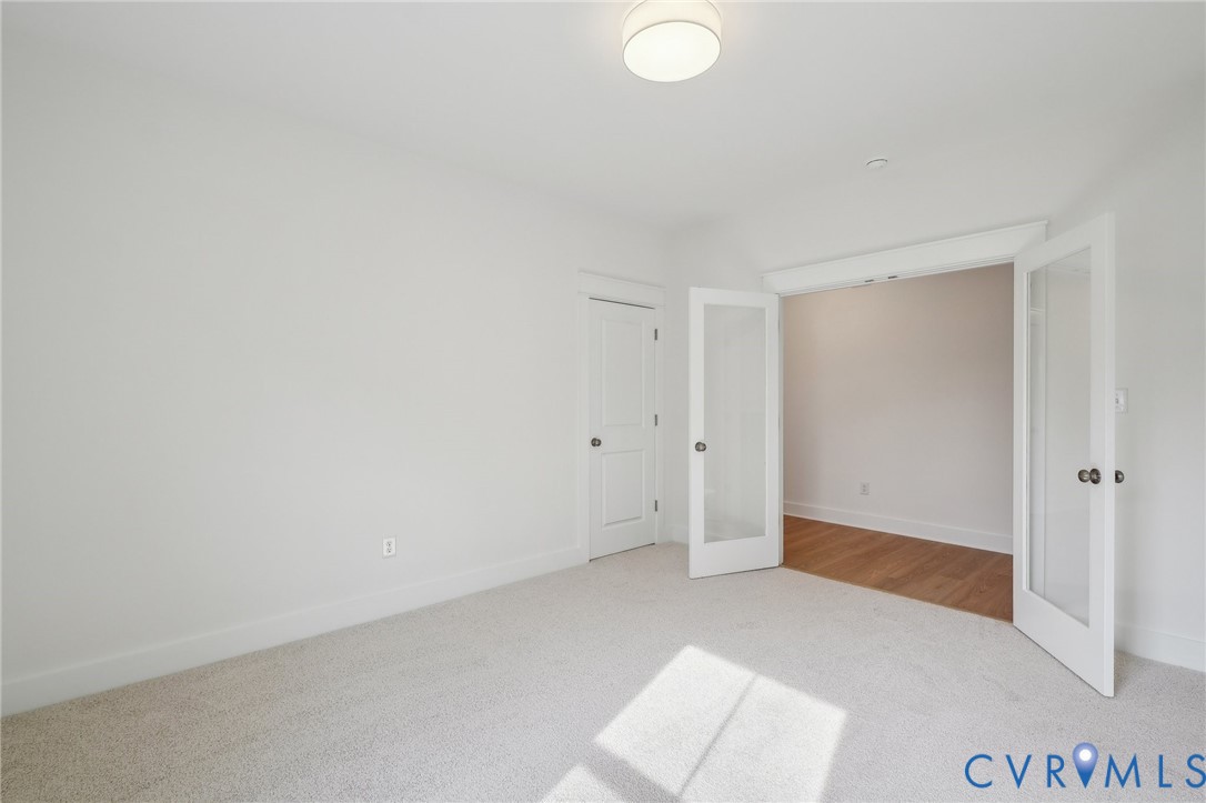 0 Atlee Road Mechanicsville, VA 23116 - Photo 23 of 32 Unfurnished bedroom featuring french doors and car