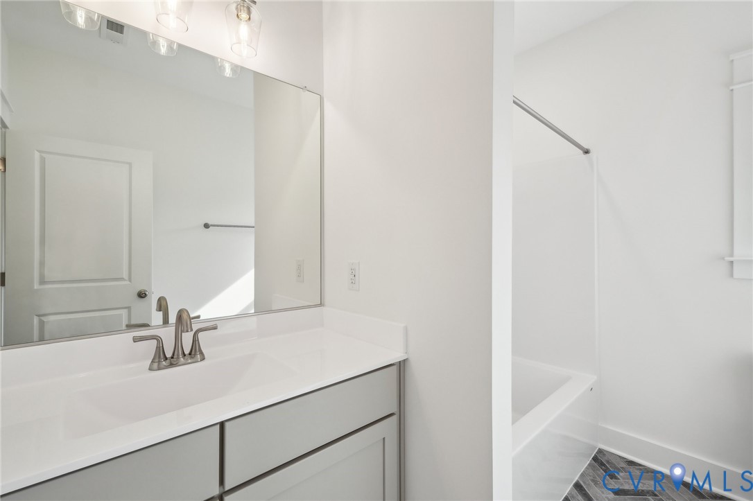 0 Atlee Road Mechanicsville, VA 23116 - Photo 25 of 32 Full bathroom featuring vanity and shower combina