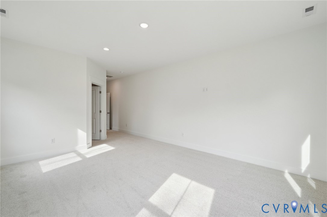 0 Atlee Road Mechanicsville, VA 23116 - Photo 29 of 32 Carpeted spare room with recessed lighting and bas