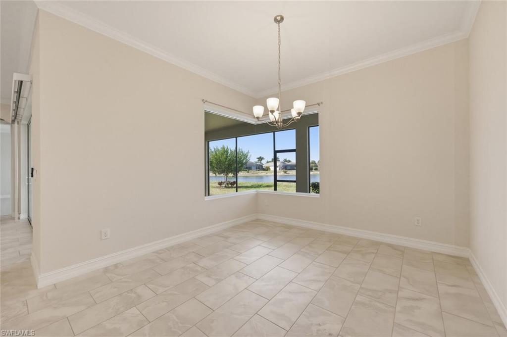 28053 Captiva Shell Loop Bonita Springs, FL 34135 - Photo 10 of 50 a view of an empty room with a window