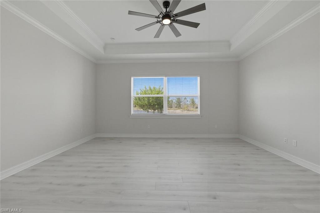 28053 Captiva Shell Loop Bonita Springs, FL 34135 - Photo 16 of 50 an empty room with a window