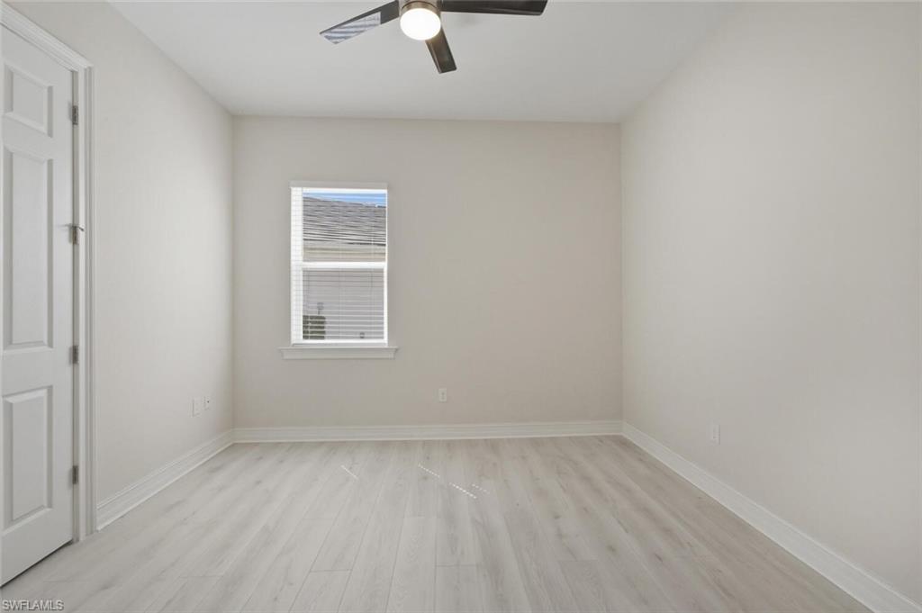 28053 Captiva Shell Loop Bonita Springs, FL 34135 - Photo 23 of 50 an empty room with a window
