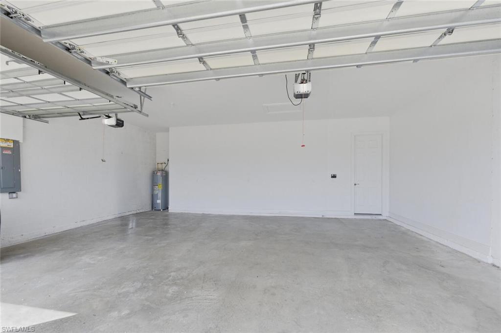 28053 Captiva Shell Loop Bonita Springs, FL 34135 - Photo 31 of 50 a view of a garage