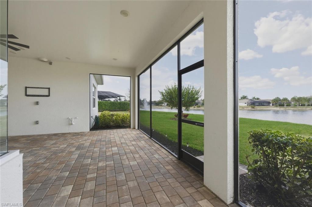 28053 Captiva Shell Loop Bonita Springs, FL 34135 - Photo 34 of 50 a view of a big room with a big yard