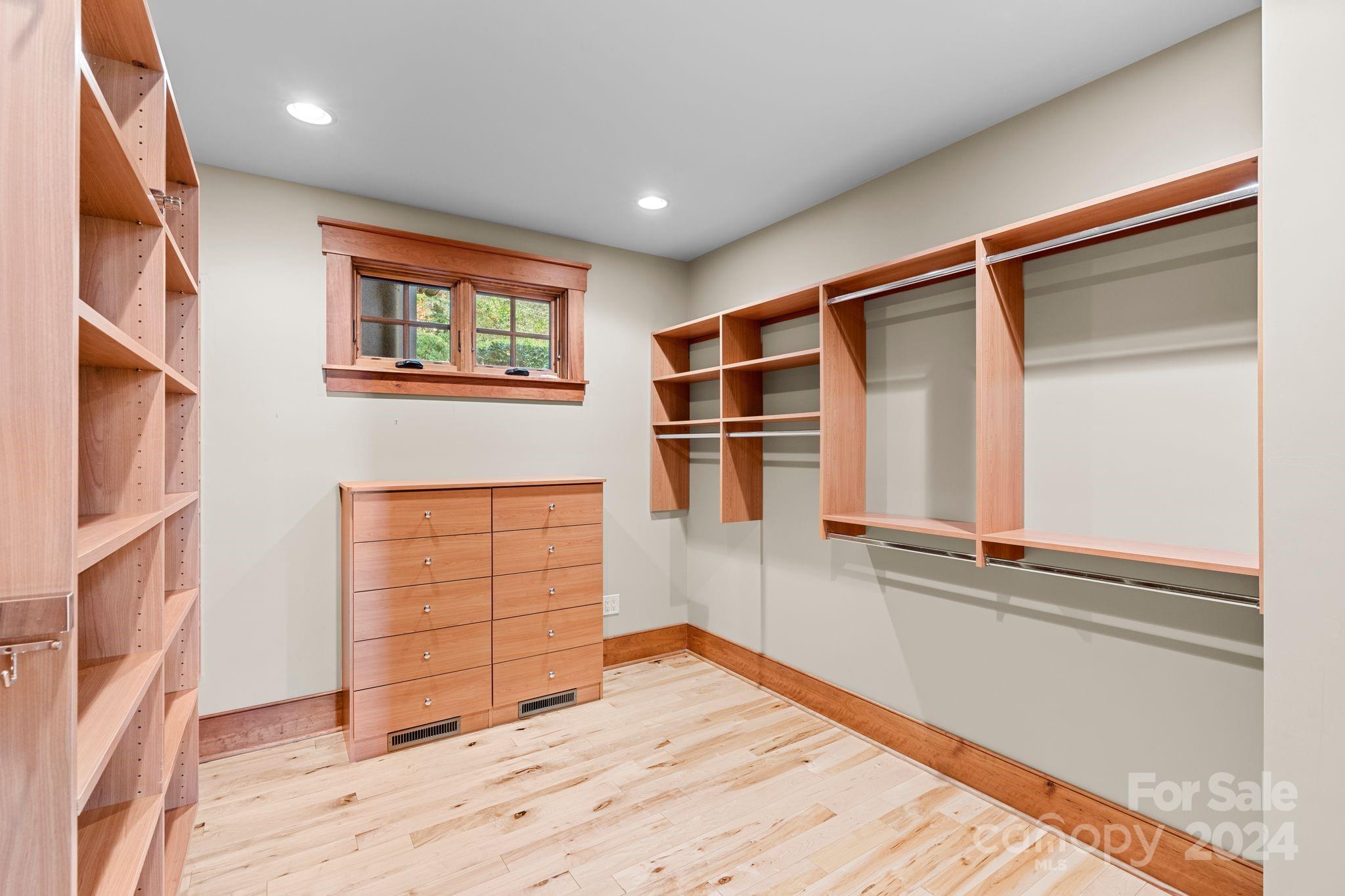 150 Cherry Hill Mill Spring, NC 28756 - Photo 14 of 39 a view of an empty room with wooden floor and a window