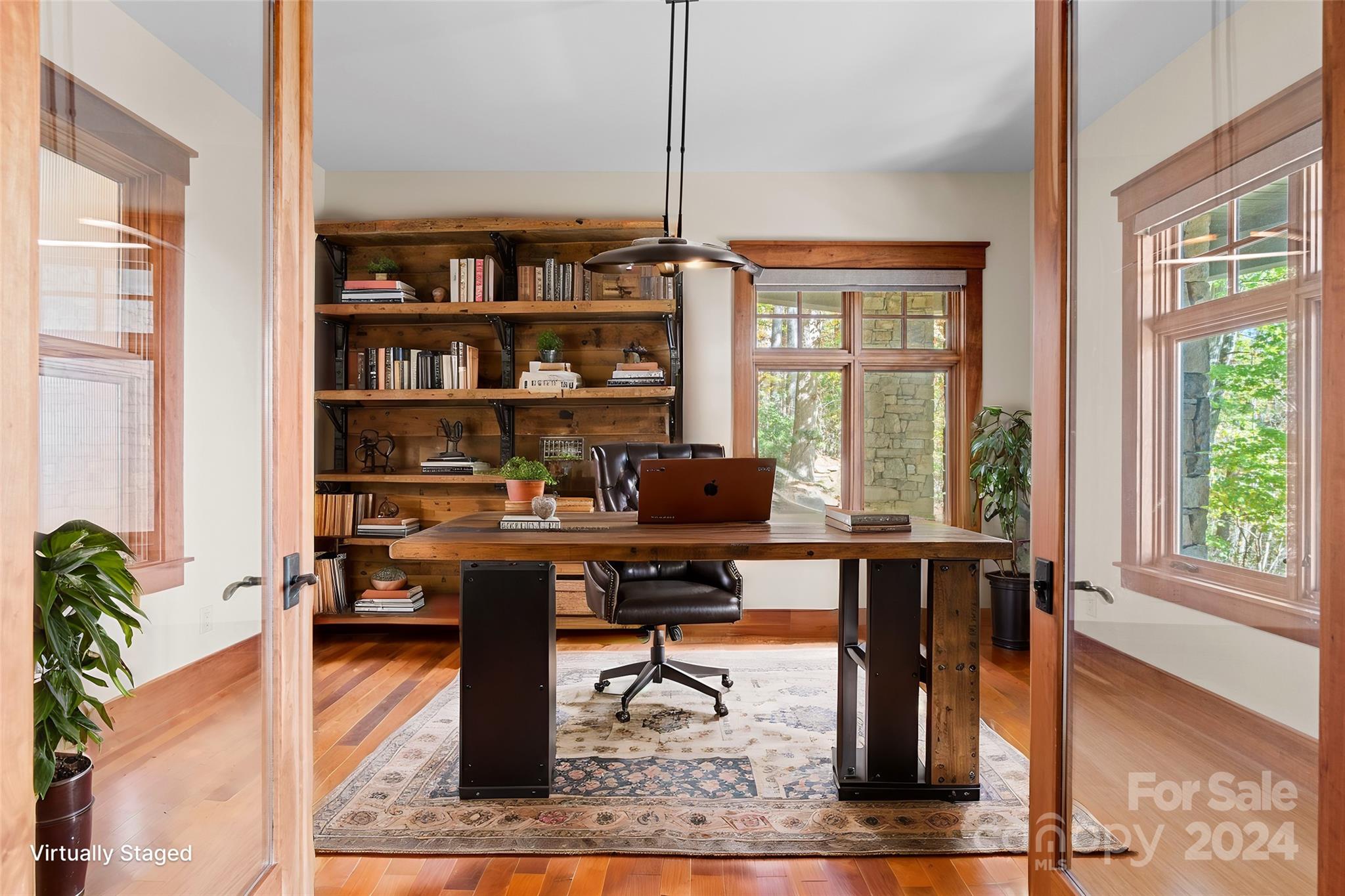 150 Cherry Hill Mill Spring, NC 28756 - Photo 22 of 39 a view of a workspace with furniture and a window