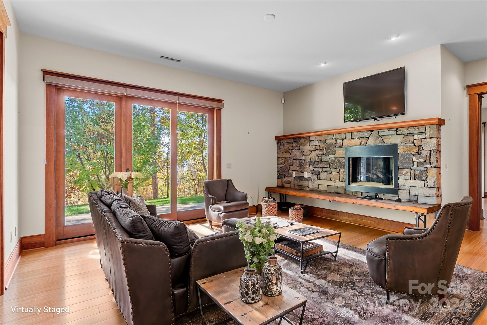 150 Cherry Hill Mill Spring, NC 28756 - Photo 23 of 39 a living room with furniture and a fireplace