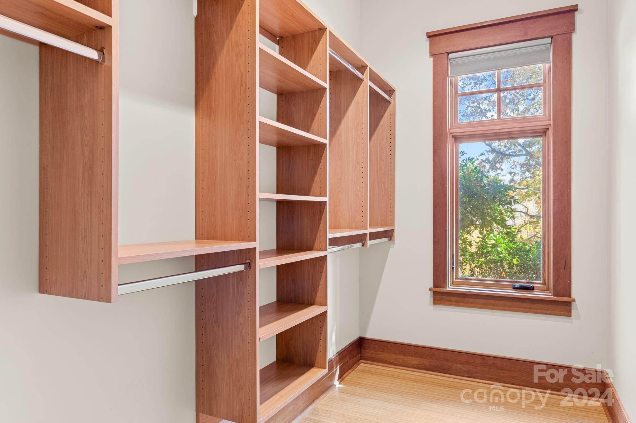 150 Cherry Hill Mill Spring, NC 28756 - Photo 26 of 39 a view of an empty room with a window and wooden floor