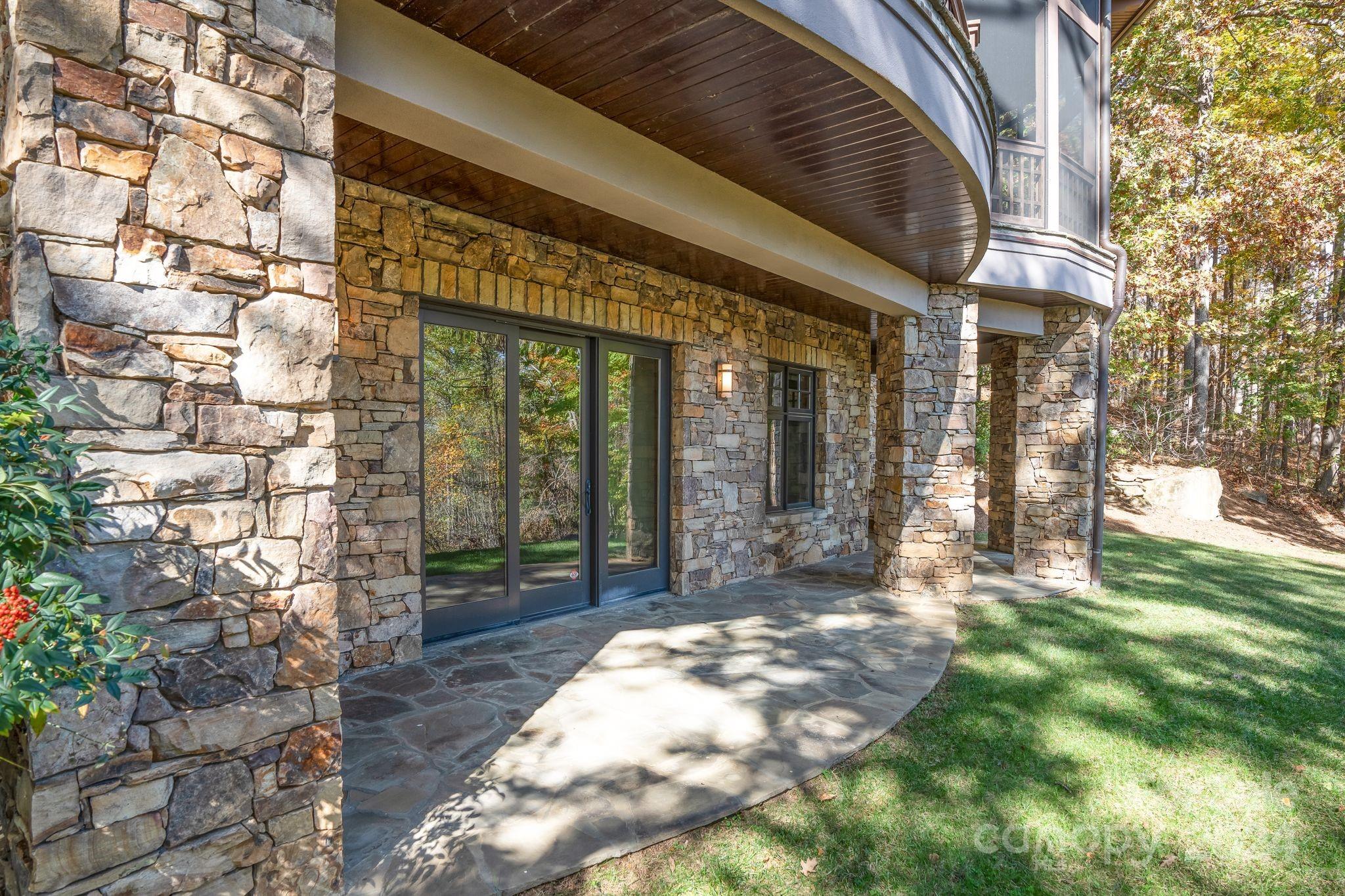 150 Cherry Hill Mill Spring, NC 28756 - Photo 27 of 39 a view of a porch with a tree