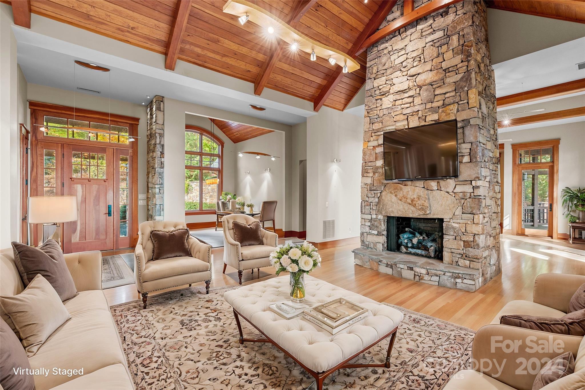 150 Cherry Hill Mill Spring, NC 28756 - Photo 6 of 39 a living room with furniture a fireplace and a flat screen tv