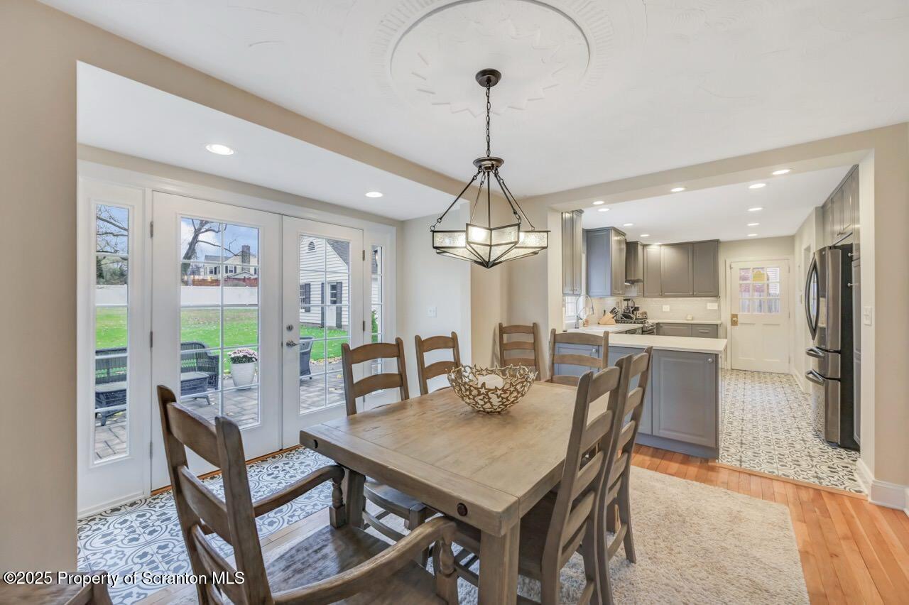 235 North Abington Road Clarks Green, PA 18411 - Photo 20 of 79 a view of a dining room with furniture wooden floor and chandelier
