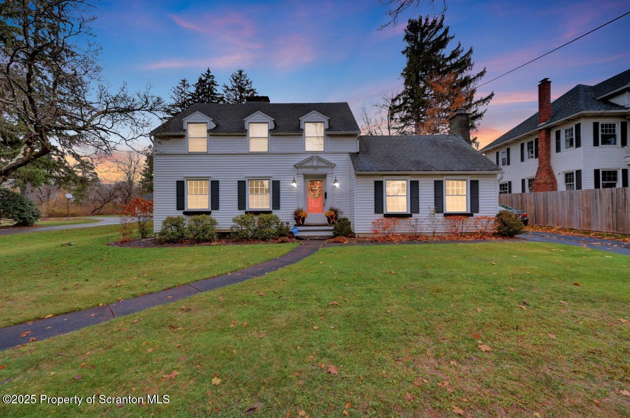 235 North Abington Road Clarks Green, PA 18411 - Photo 2 of 79 a front view of a house with a yard and trees
