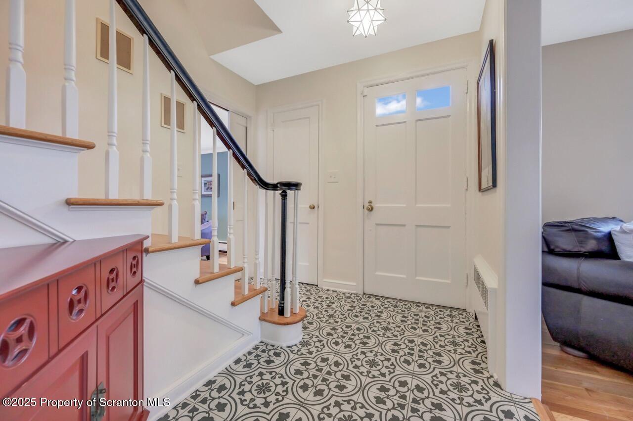 235 North Abington Road Clarks Green, PA 18411 - Photo 40 of 79 a view of front door with stairs