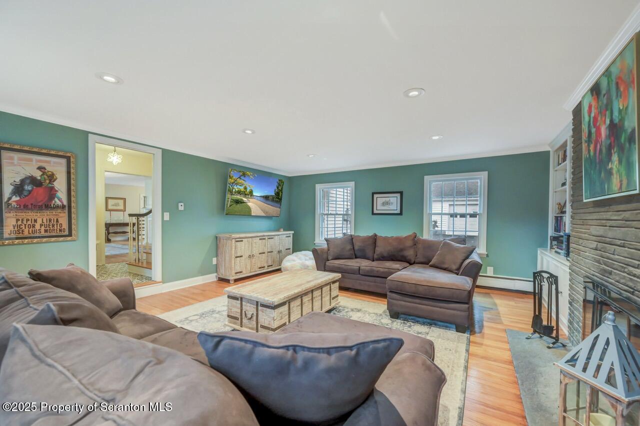 235 North Abington Road Clarks Green, PA 18411 - Photo 45 of 79 a living room with furniture and a wooden floor