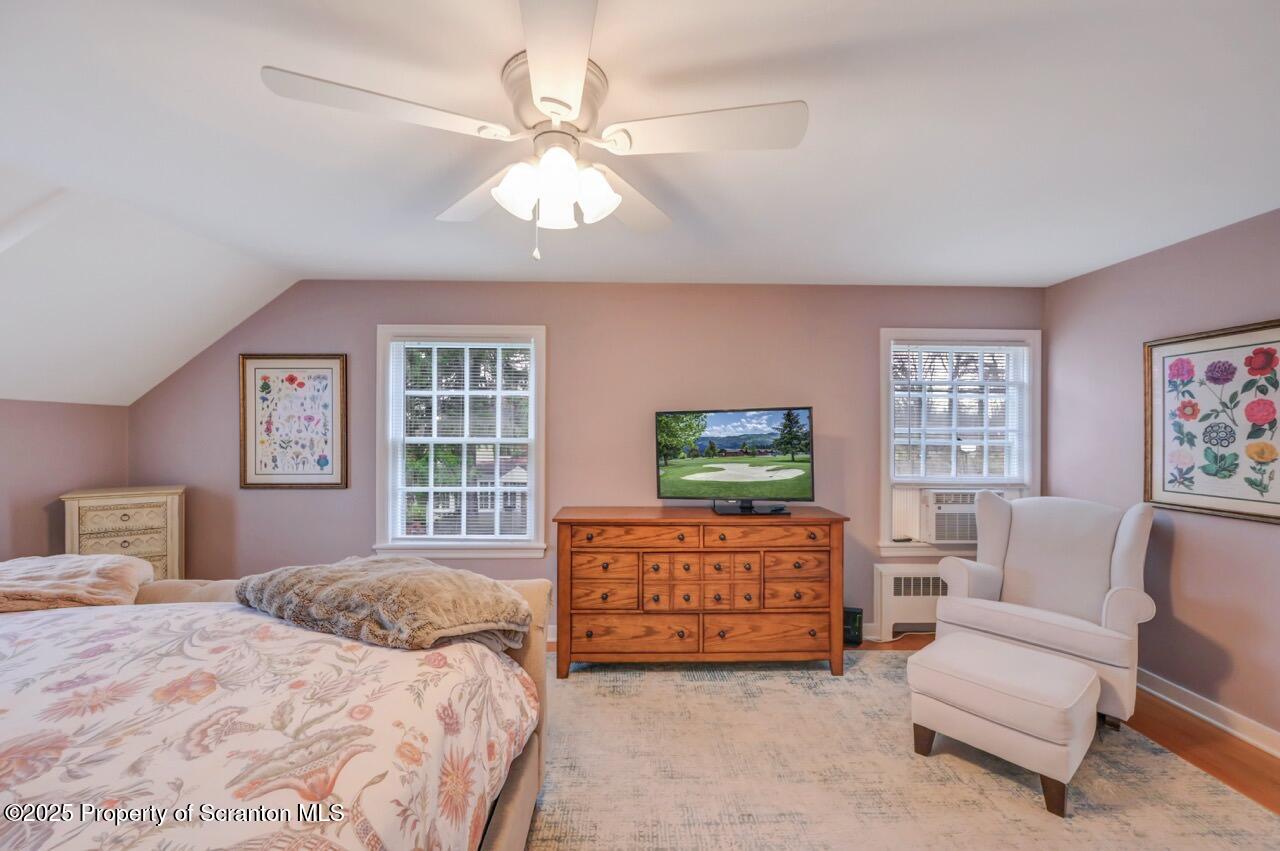 235 North Abington Road Clarks Green, PA 18411 - Photo 51 of 79 a bedroom with furniture and a flat screen tv