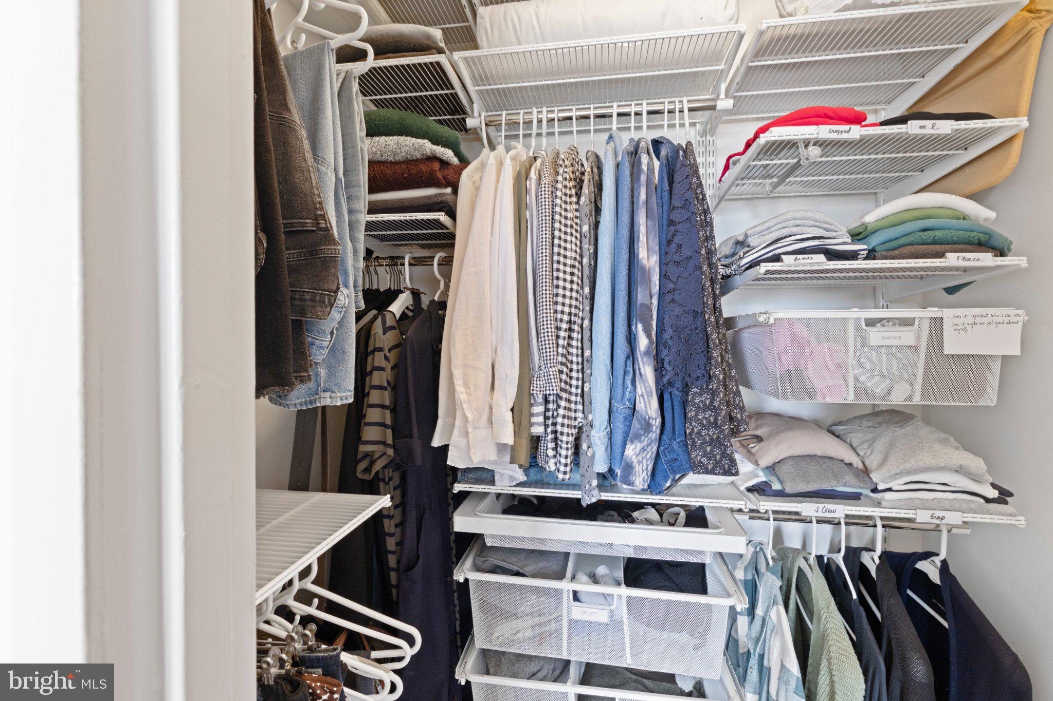 2001 Hamilton Street, Unit 1119 Philadelphia, PA 19130 - Photo 21 of 44 Organized closet with stylish attire.