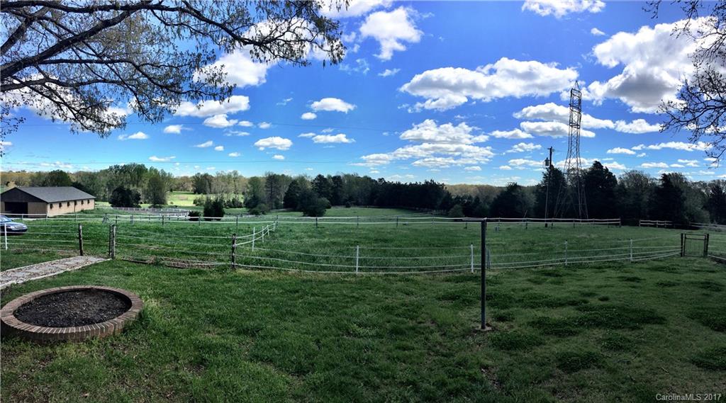 7503 Potter Road Waxhaw, NC 28173 - Photo 12 of 18 a view of a green field