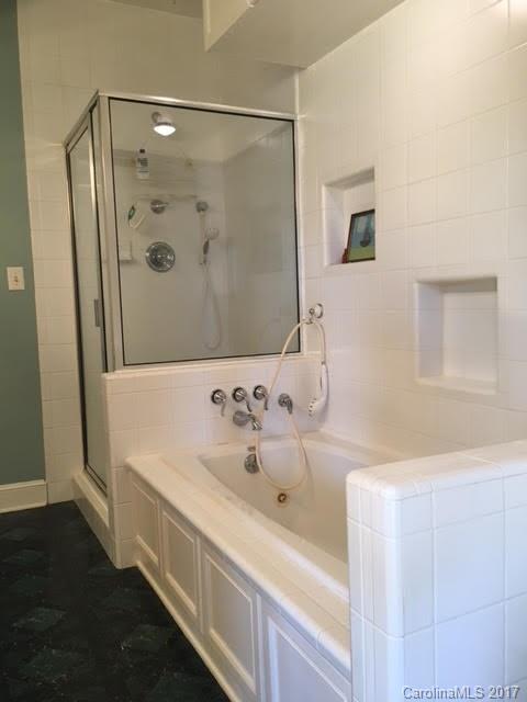 7503 Potter Road Waxhaw, NC 28173 - Photo 4 of 18 a bathroom with a sink and a mirror