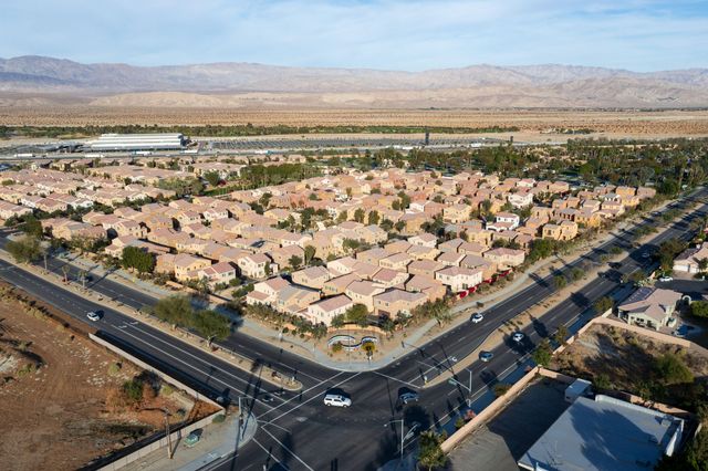 an aerial view of residential building with outdoor space