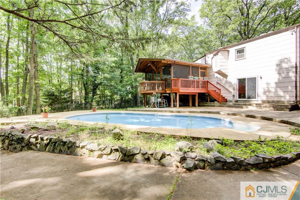 24 Donald Road East Brunswick, NJ 08816 - Photo 20 of 20 a view of a house with swimming pool