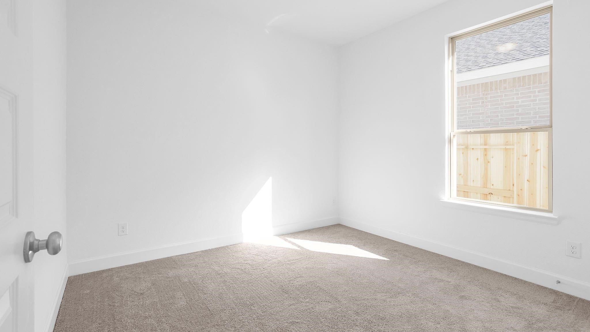 20714 Open Range Court Tomball, TX 77377 - Photo 10 of 15 an empty room with a window