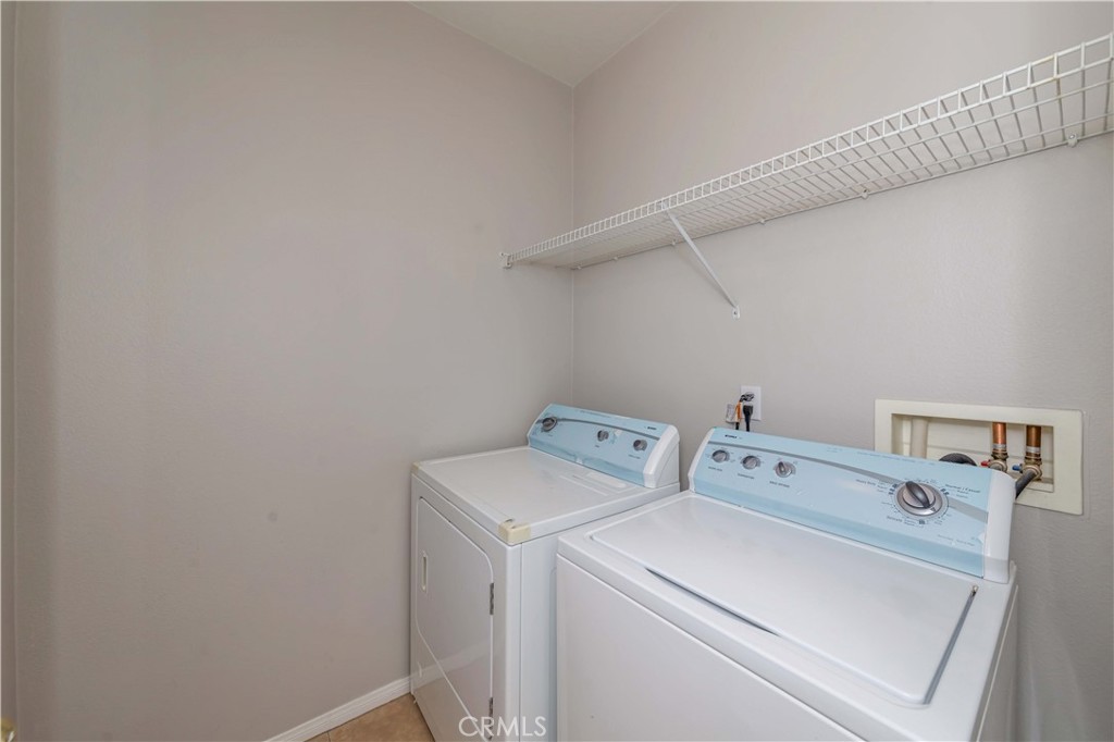 372 Quail Irvine, CA 92603 - Photo 10 of 22 a utility room with dryer and washer