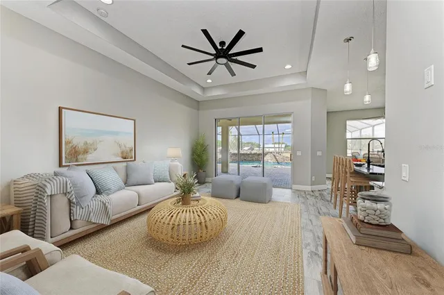 an aerial view of a house with a lake view