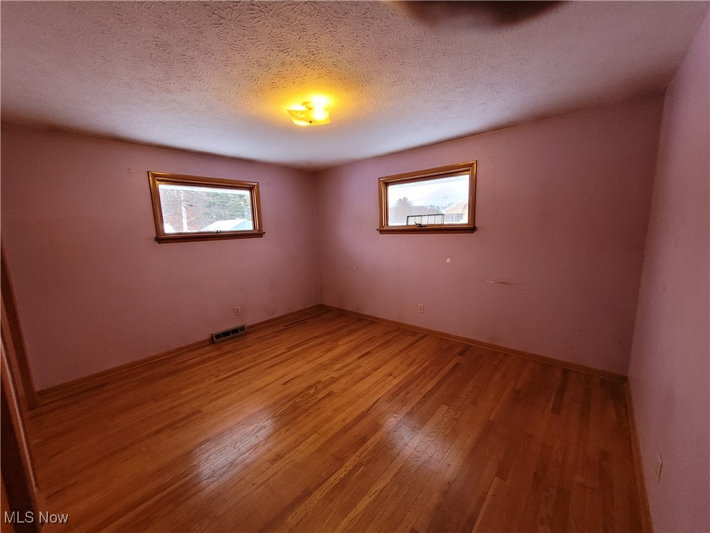 14855 Drake Road Strongsville, OH 44136 - Photo 9 of 15 Primary bedroom with hardwood floors