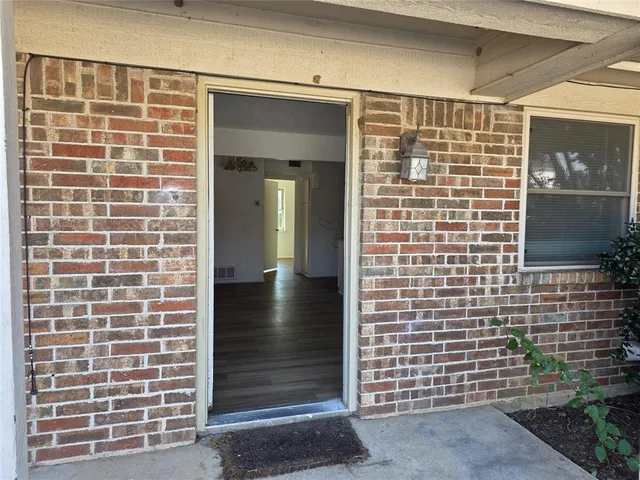 a view of front door of house and window